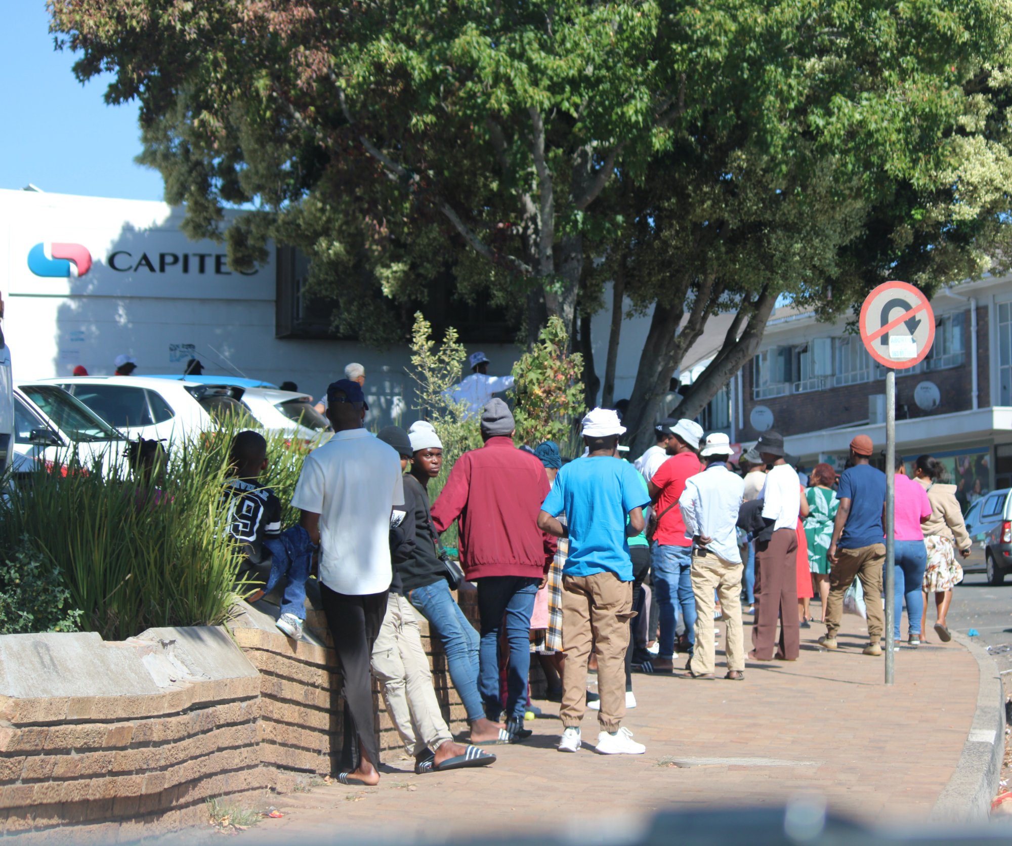 Banking day queue, rural town